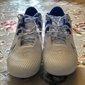 Nike White and Blue Renew Cleats